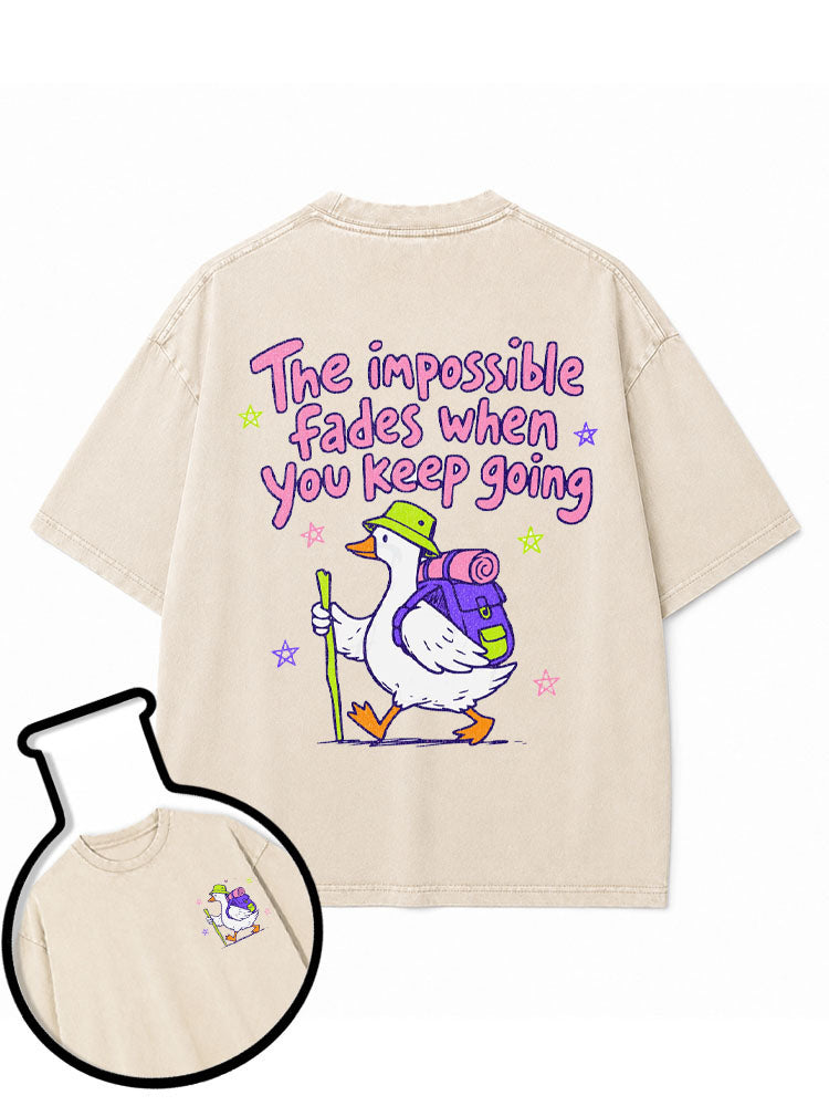 The impossible fades when you keep going Washed T-Shirt