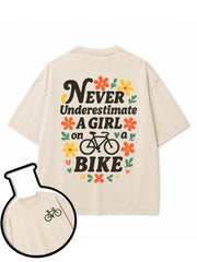 NEVER Underestimate A GIRL on a BIKE Washed T-Shirt