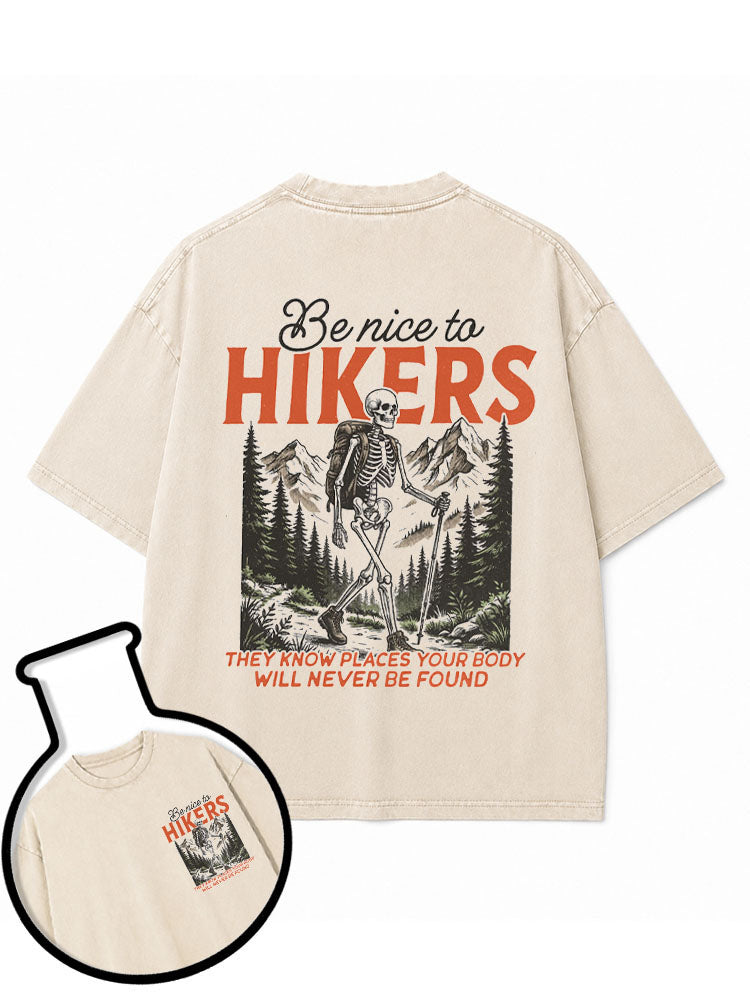 Be nice to HIKERS THEY KNOW PLACES YOUR BODY WILL NEVER BE FOUND Washed T-Shirt