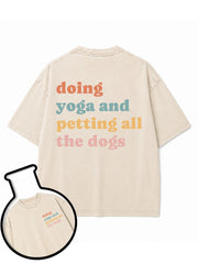 doing yoga and petting all the dogs Washed T-Shirt