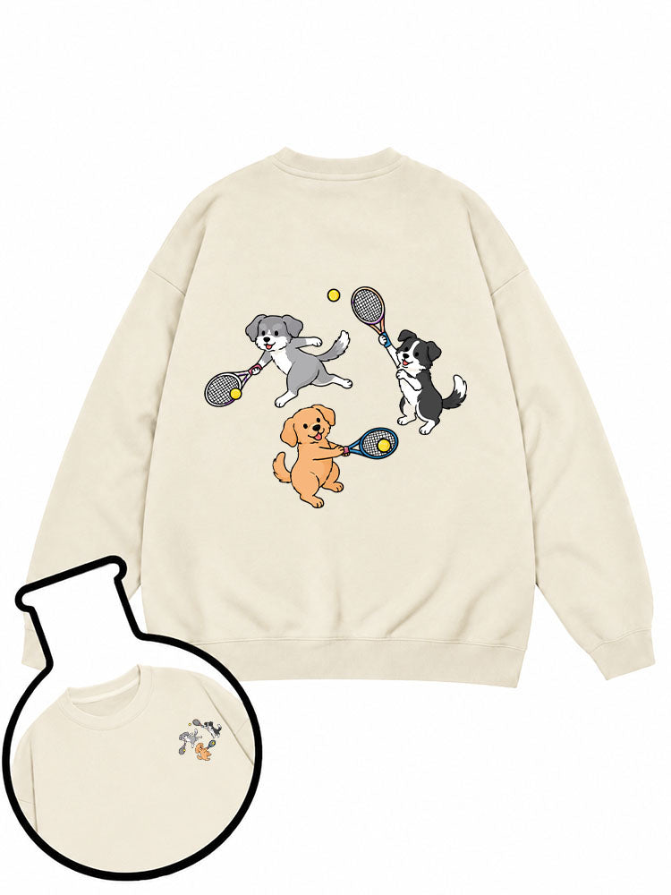 Dogs playing tennis Sweatshirt