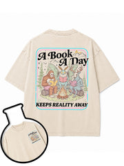A Book A Day KEEPS REALITY AWAY Washed T-Shirt